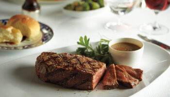 1548636236.0919_r244_Holland America Koningsdam Dining Culinary_KB14_Pinnacle_New_York_Strip_Steak_48612_alt_1920x1080.jpg